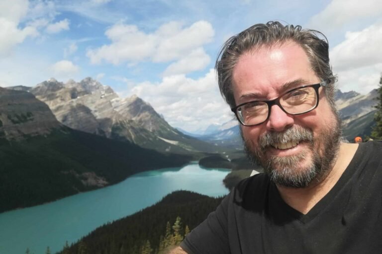 Author posting in front of Peyto Lake along the Icefields parkway.